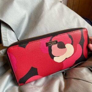 kate spade floral zip-around wallet in pink, red, black